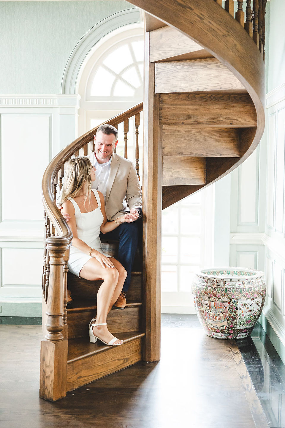 	13.	Groom walking up the spiral staircase to meet his bride-to-be at the Estate at River Run.