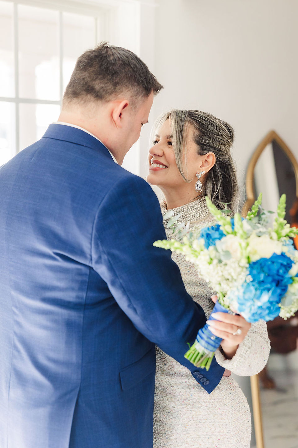 	7.	Bride smiling up at the groom during their intimate wedding ceremony in Richmond