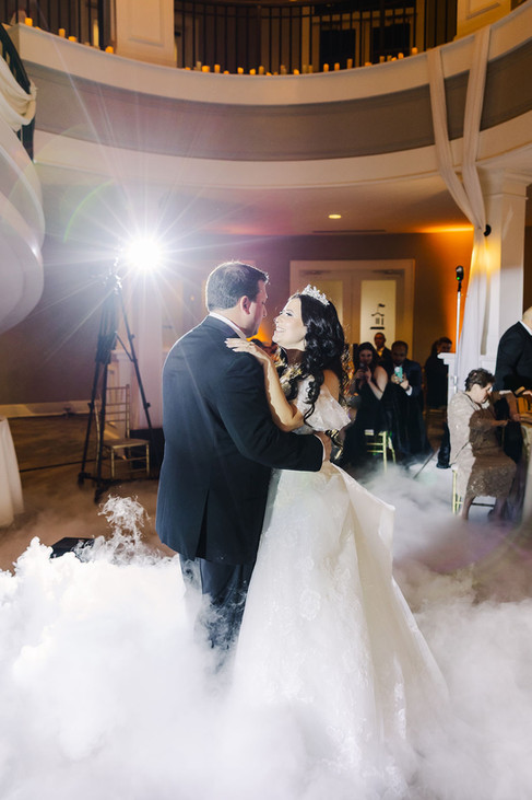 8️⃣ Couple sharing first dance on the ballroom floor — elegant wedding reception moment at The Dominion Club.