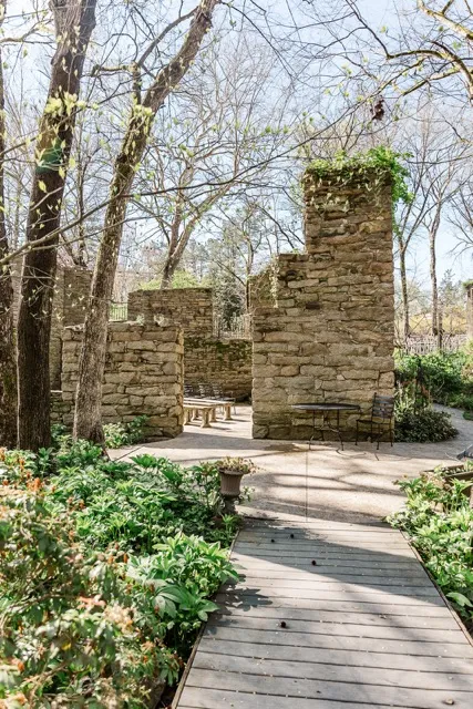 	10.	Scenic wooden bridge surrounded by trees at The Mill at Fine Creek, perfect for wedding photos and intimate moments.