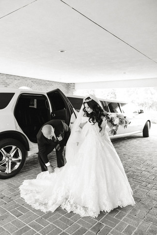 7. Father holding bride’s hand as they walk toward the church entrance — emotional wedding photography moment in Richmond, VA.