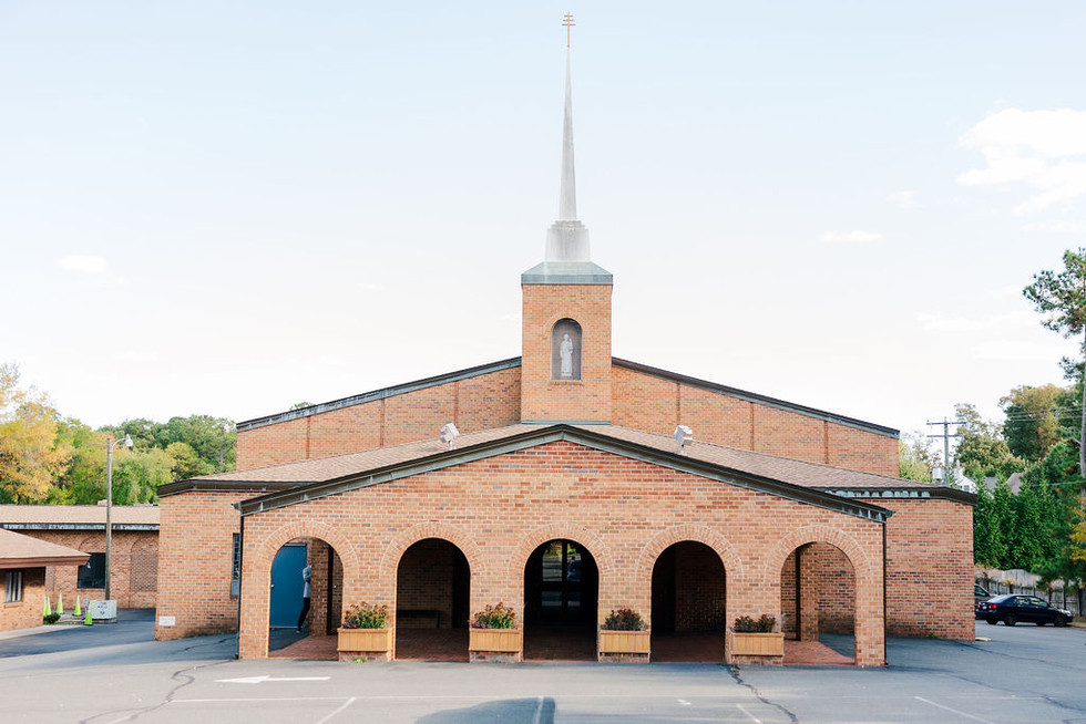1. Exterior of church with tall white steeple and brick façade — classic Richmond wedding ceremony location.