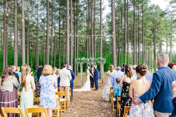 6. Outdoor ceremony setup at pine tree grove in Virginia