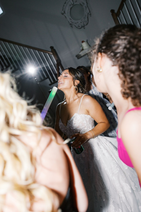 22. Bride singing and dancing with guests during Virginia wedding reception