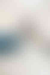 10. Bride holding bouquet and turning gracefully in her wedding gown — fine-art bridal portrait at The Dominion Club in Richmond.