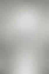 5. Black and white photo of couple sharing first kiss and walking out of church — timeless Richmond wedding photographer image.