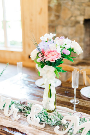 4. Pastel pink and white flower centerpiece in vintage vase