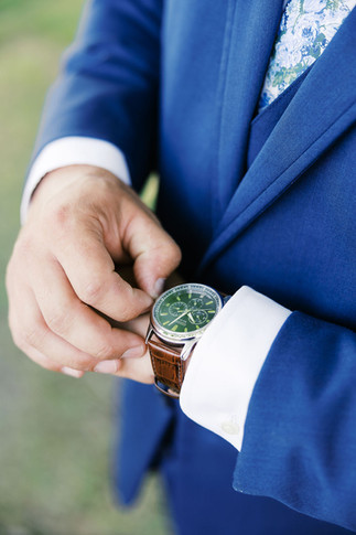 10. Groom adjusting watch before Foxrun Venue & Events wedding