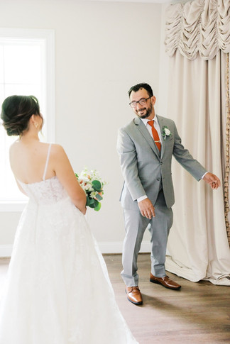 38. Father seeing bride during emotional first look before wedding ceremony