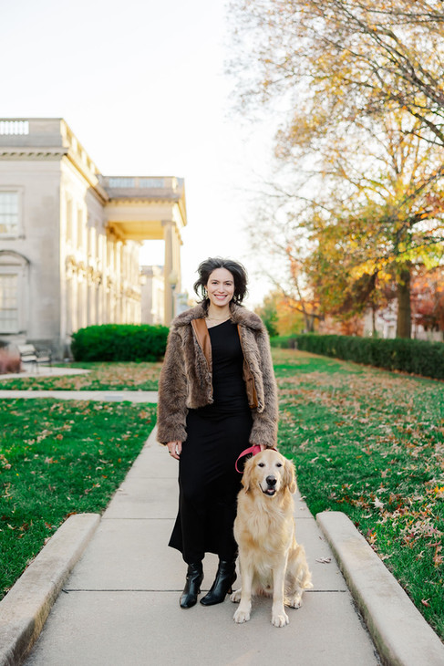 	1.	Woman walking her dog during a golden hour family photography session at VMFA in Richmond, Virginia