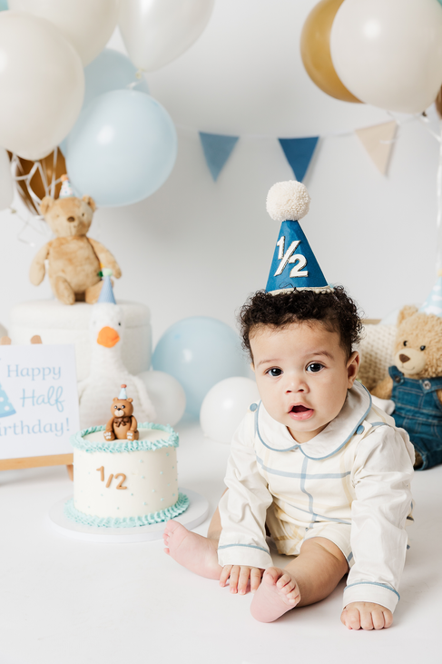 12. Baby boy half birthday portrait with cake and teddy bear in Richmond studio