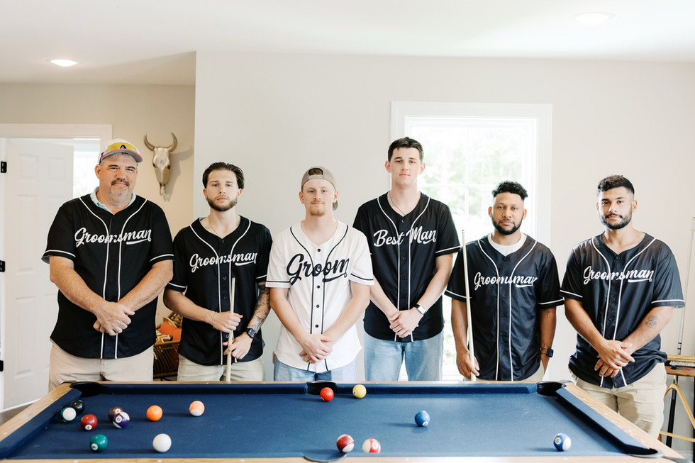 7. Groomsmen playing pool while getting ready at Antebellum of New Kent