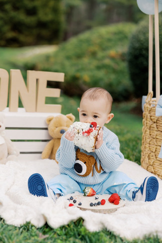 Cake smash photo of baby boy with colorful balloon decor in Richmond VA