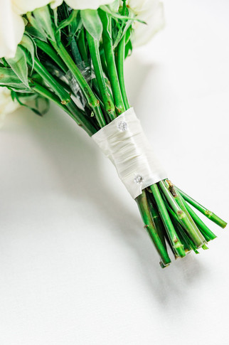 6. Close-up of bouquet stems tied with ivory ribbon for an intimate Richmond VA elopement