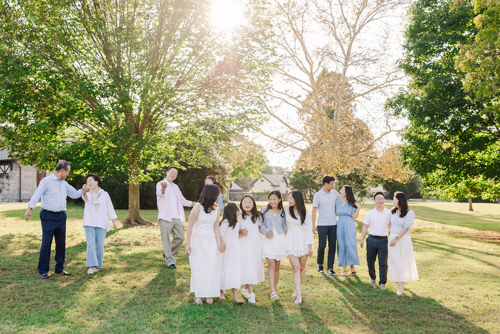 Grandfather and grandmother sharing a sweet moment during their spring family session at Maymont.