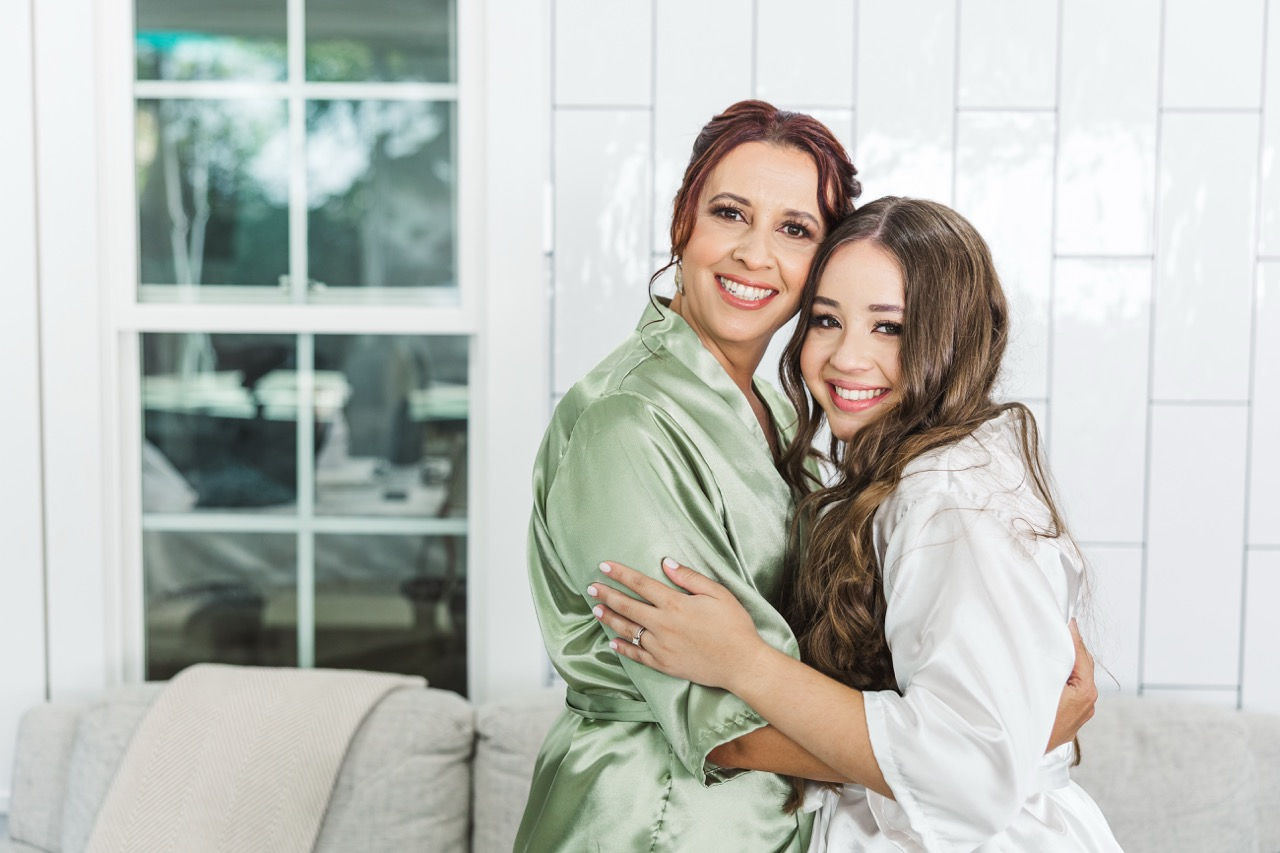 	14.	“Bride hugging her mother on wedding morning captured by Virginia wedding photographer”