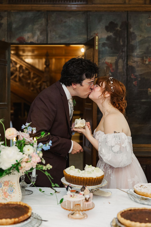 	7.	Bride and groom laughing while slicing wedding pie