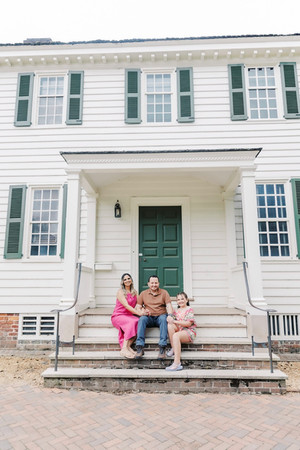 	12.	Mom and daughter sitting on white steps together
