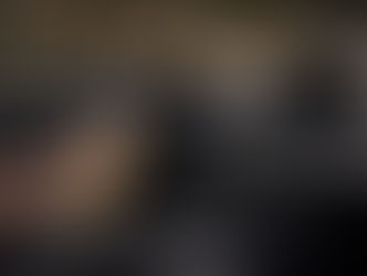 Professional detailer cleaning modern Porsche interior using safe pH-balanced interior method