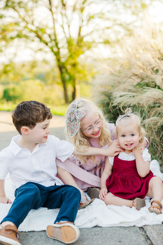 Natural light portrait of a young girl during a family photo session at Libby Hill Park in Richmond Virginia