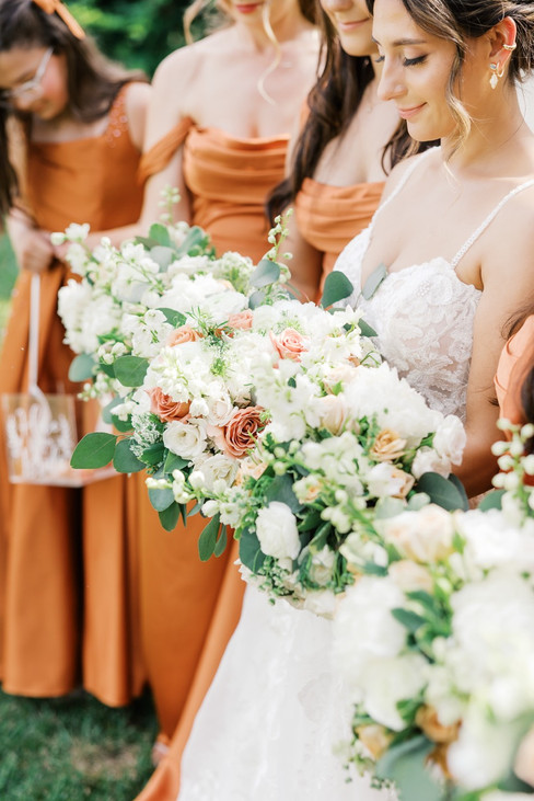 18. Bride with bridesmaids in copper dresses at Antebellum of New Kent wedding