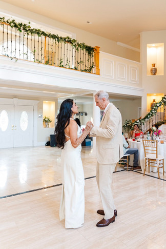 Nyiela and Don’s stylish second outfit for their wedding day, captured by a Richmond Virginia wedding photographer