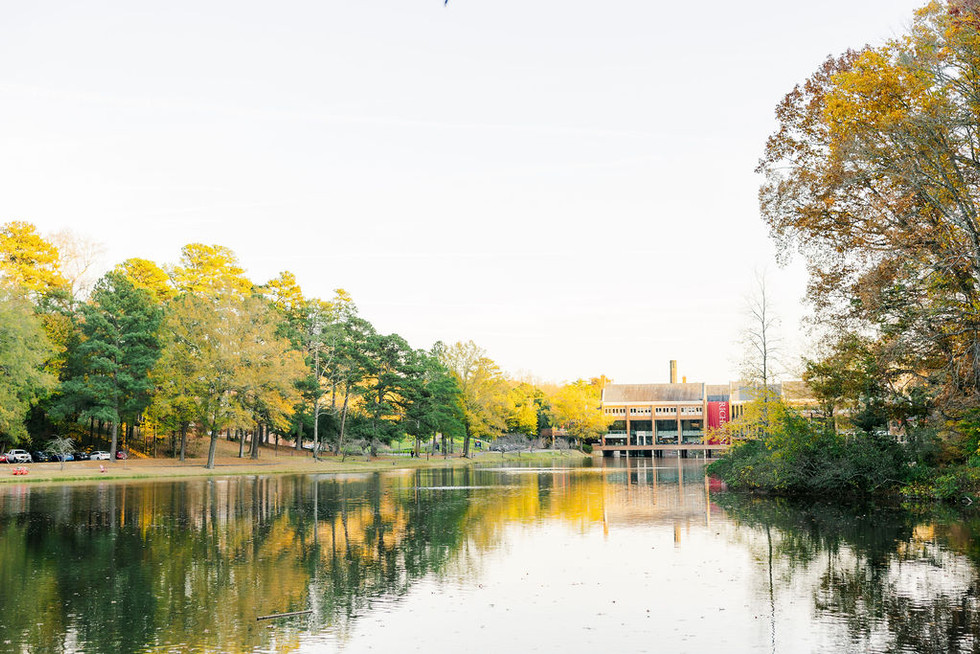 9️⃣ University of Richmond lake view fall foliage engagement photo