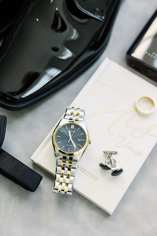 3. Polished black wedding shoes, gold watch, and cologne — classic groom flat lay photographed by Richmond wedding photographer.