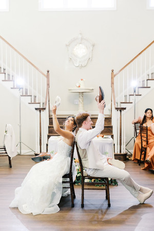 16. Bride and groom celebrating at sweetheart table at Antebellum of New Kent