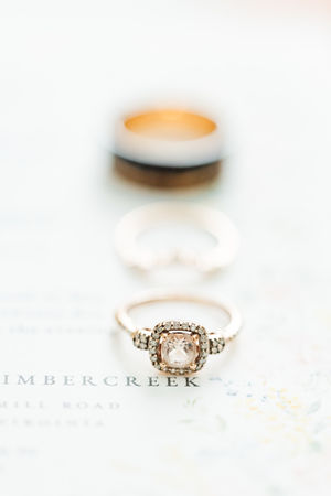 2. Groom’s ring with black band on white background