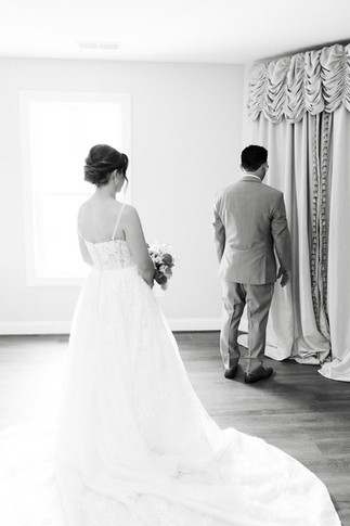 37. Bride walking to first look with father at Antebellum of New Kent
