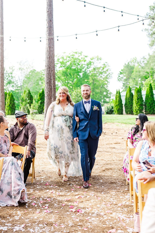 	15.	Bride’s family walking down aisle at Virginia wedding