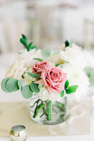 13. Three-tier white wedding cake with soft floral accents — classic Richmond wedding photographer detail shot.