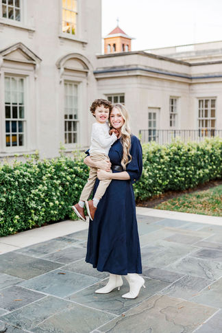 Mom lifting her son in a playful moment during a beautiful fall session in Richmond, Virginia.