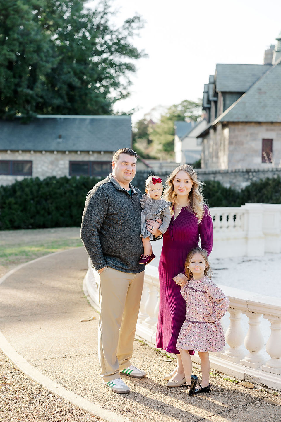 	3.	family of four posing together at Maymont Park in Richmond Virginia