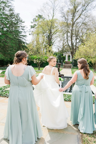 	2.	Bridal party walking through garden path together