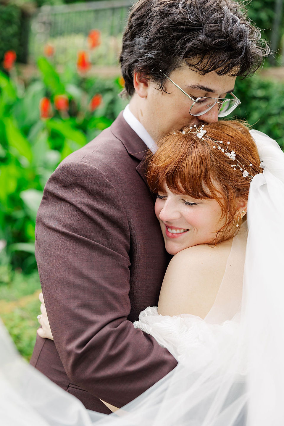	11.	Bride looking over shoulder with floral crown and veil