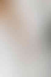 45. Close up of bride and groom holding hands on wedding day
