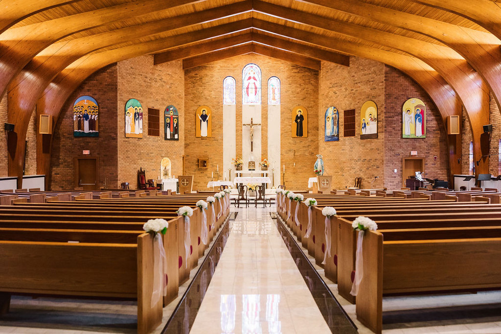 2. Church interior featuring long aisle and vaulted wood ceiling — elegant ceremony setting captured by Richmond wedding photographer.