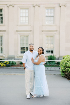 1. Sallie and Anthony smiling during their spring engagement session at the VMFA