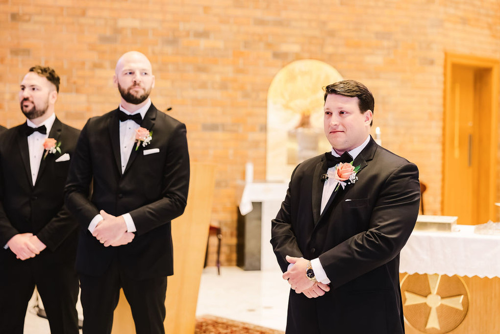 10. Groom watching bride approach the altar — emotional first look during church ceremony in Richmond, Virginia.