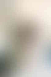 5. Bride standing in bridal suite with full gown and bouquet — elegant wedding morning moment in Richmond, VA.