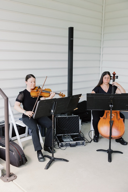 1. Ceremony musicians playing violin and cello at Antebellum of New Kent wedding