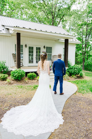 2. Bride walking up to groom for first look moment