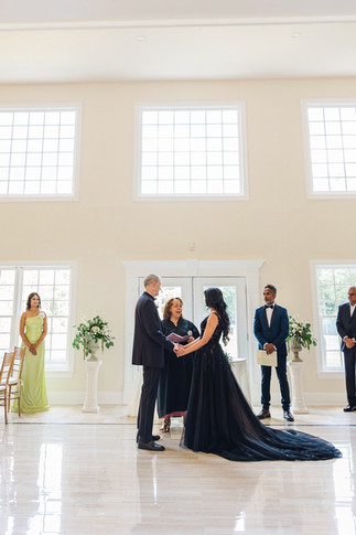 Nyiela and Don exchanging vows at their Richmond Virginia wedding, photographed by a Richmond Virginia wedding photographer