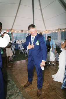 18. Groom dancing during Virginia countryside wedding reception