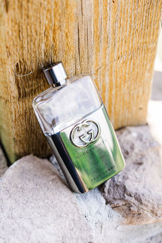 3. Groom’s cologne bottle with personalized label
