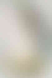 13. Three-tier white wedding cake with soft floral accents — classic Richmond wedding photographer detail shot.