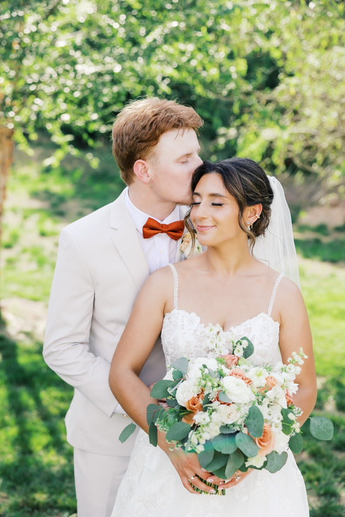 3. Bride and groom hugging during wedding portraits in New Kent Virginia