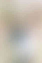 13. Bride and groom sharing a private moment in a scenic wooded area